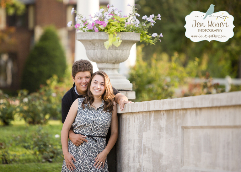 Jen Moser Photography_ Indiana Photographer_ Engagment photography_ couple at park_Fort Wayne, Indiana the Rose Garden Lakside Park_couple by wall